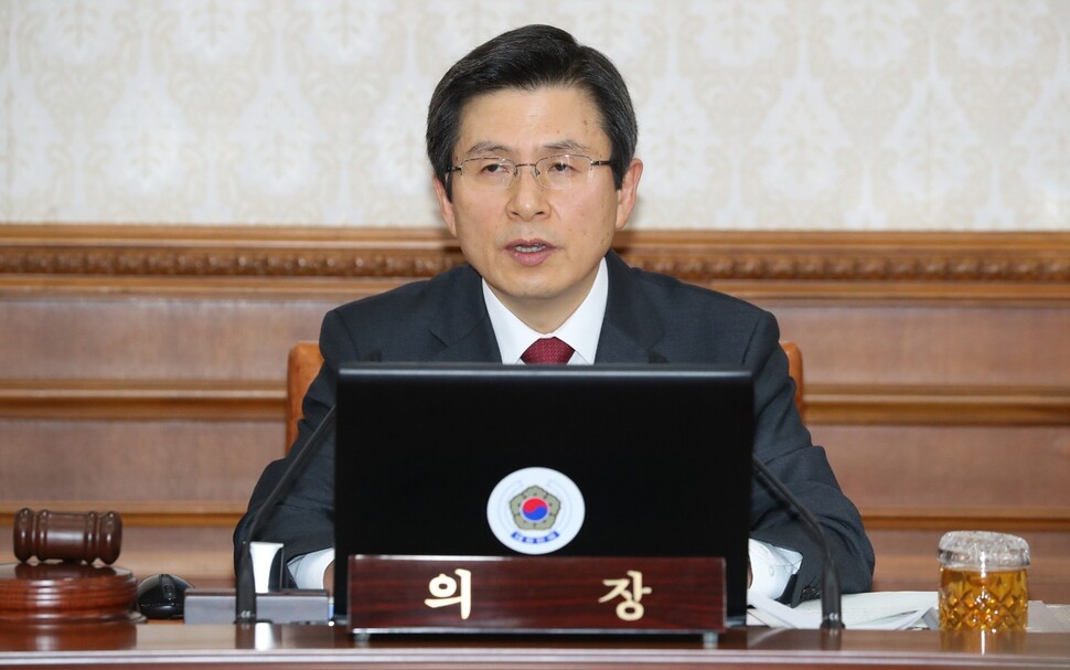 Prime Minister and acting president Hwang Kyo-ahn speaks at a cabinet meeting at the Central Government Complex in Seoul