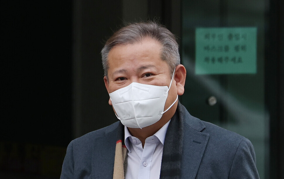 Lee Sang-min, the interior and safety minister facing impeachment proceedings, steps out of his home in Seoul’s Gangnam District on Feb. 9. (Yonhap)