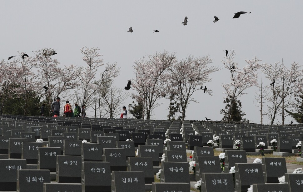 Ravens gather on the headstones of victims of the Apr. 3 Jeju Uprising and Massacre at the Apr. 3 Peace Park in the Bongae neighborhood of Jeju City.

