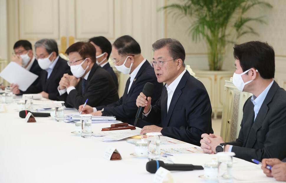 South Korean President Moon Jae-in speaks during a Blue House roundtable meeting on the economic impact of COVID-19 on Apr. 18. (Blue House photo pool)