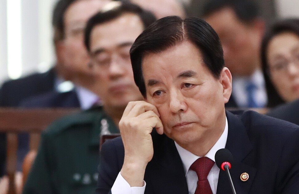 Minister of National Defense Han Min-koo listens to a question from Justice Party lawmaker Kim Jong-dae at a hearing of the National Assembly National Defense Committee