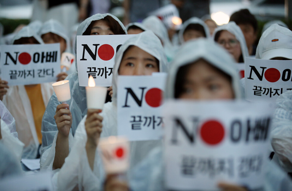 South Korean demonstrators express their support for a nationwide boycott campaign against Japanese products in front of the Japanese Embassy in Seoul on July 25.