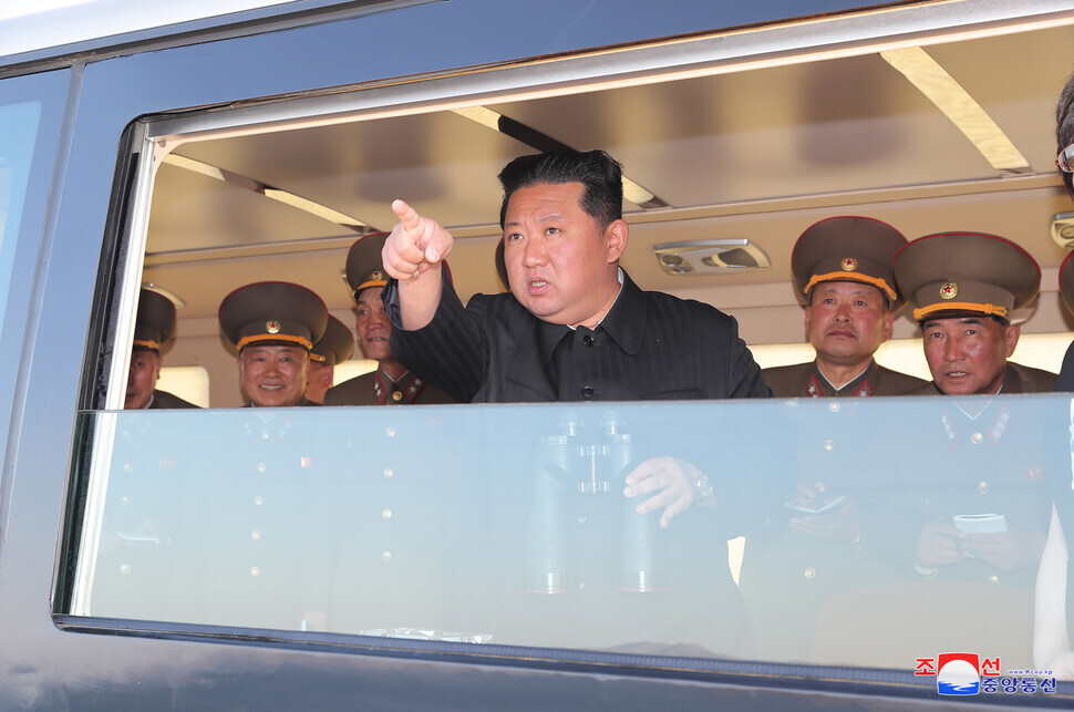 North Korean leader Kim Jong-un observes the test-firing of a “new-type tactical guided weapon,” according to a front-page article in the April 17 edition of the party-run Rodong Sinmun. (KCNA/Yonhap News)