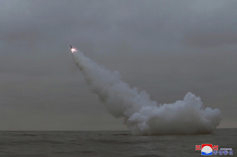 Released on March 13 by North Korean state media, this photo shows one of the reported two strategic cruise missiles fired from a submarine in the early hours of March 12. (KCNA/Yonhap)