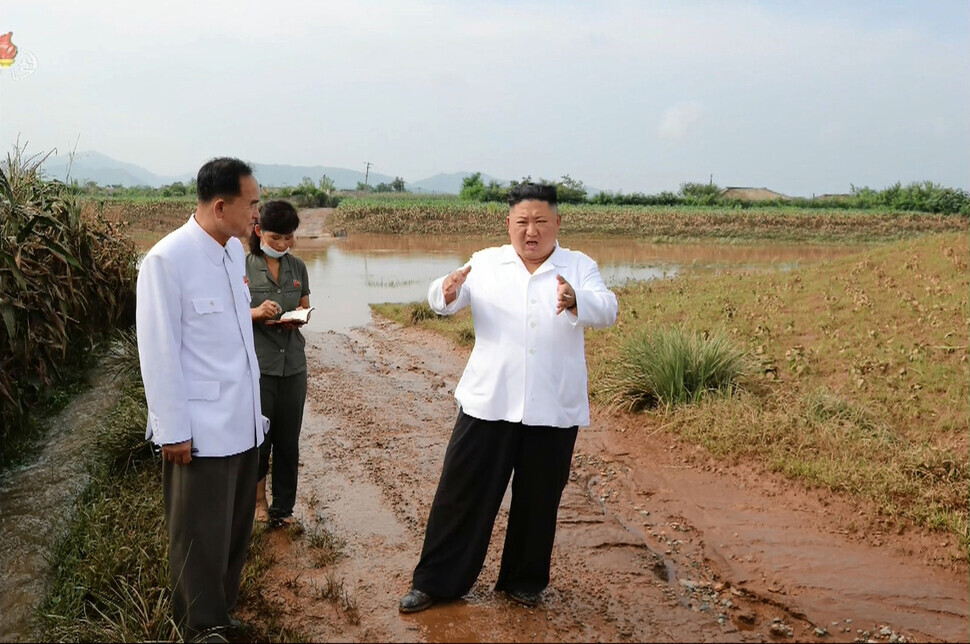 Footage of North Korean leader Kim Jong-un visiting a site of flood damage in Unpa County, North Hwanghae Province, broadcasted by Korean Central Television on Aug. 7. (KCTV screenshot/Yonhap News)