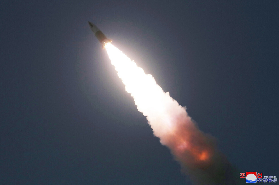 This photo provided by the Korean Central News Agency shows short-range ballistic missile test-fire at an undisclosed location in North Korea in March 2020. (Yonhap News)
