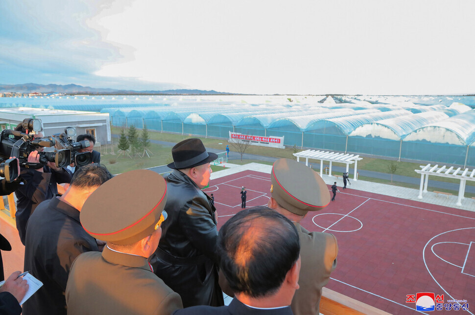 North Korea’s Kim Jong-un attends the ribbon-cutting ceremony for greenhouse farms in Ryonpho, a large producer of produce for the region, on Oct. 10, 2022. (KCNA/Yonhap)