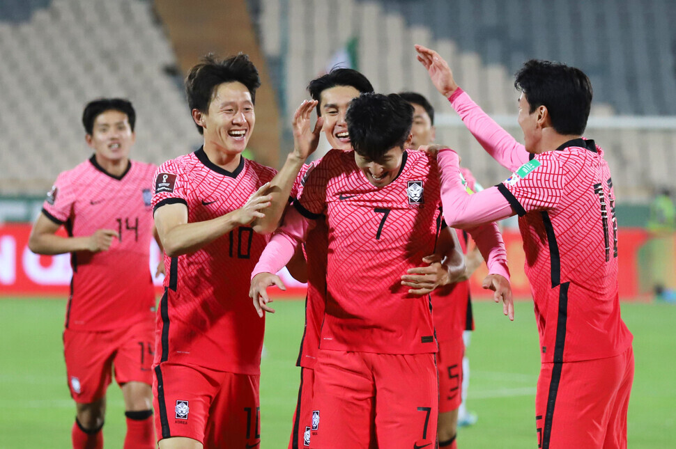Teammates congratulate Son Heung-min for scoring the first goal during a match against Iran’s national team held on Tuesday in Tehran, Iran, in the final qualifying round for the 2022 FIFA World Cup in Qatar. (Yonhap News)