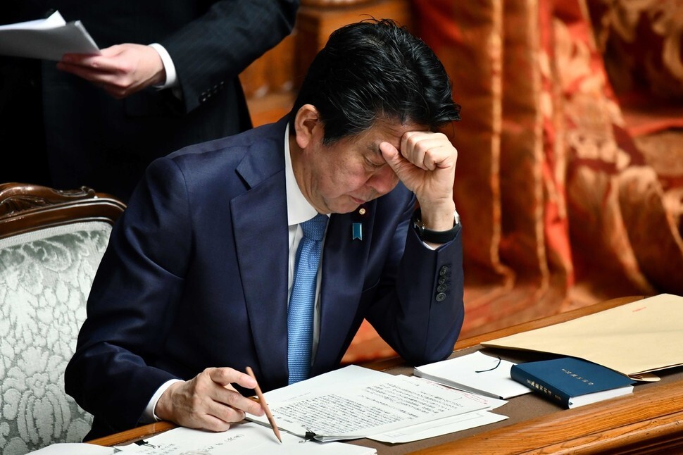 Japanese Prime Minister Shinzo Abe during a meeting of the Japanese House of Councillors on Mar. 6.(AFP)