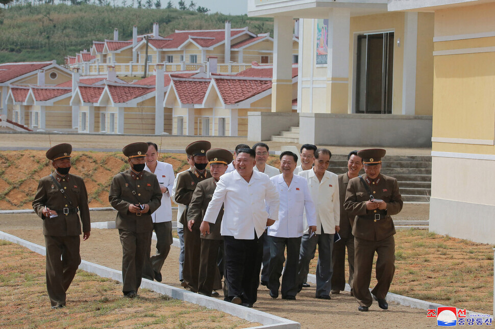 North Korean leader Kim Jong-un oversees reconstruction work in Kangbuk Village, Kumchon County, North Hwanghae Province, which took heavy flood damage from typhoons. (KCNA/Yonhap News)