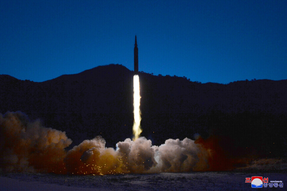 North Korean leader Kim Jong-un “watched the test-fire of [a] hypersonic missile conducted by the Academy of Defence Science on Tuesday,” with the “hypersonic glide vehicle” described as “hitting the set target in waters 1 000 km away,” the Rodong Sinmun newspaper reported in a front-page story Wednesday. (KCNA/Yonhap News)