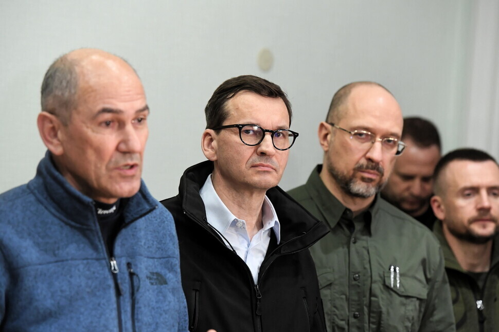 From left to right, Slovenian Prime Minister Janez Jansa, Polish Prime Minister Mateusz Morawiecki, and Ukrainian Prime Minister Denys Shmyhal take part in a joint briefing after meeting in the Ukrainian capital of Kyiv on March 15. (EPA/Yonhap News)