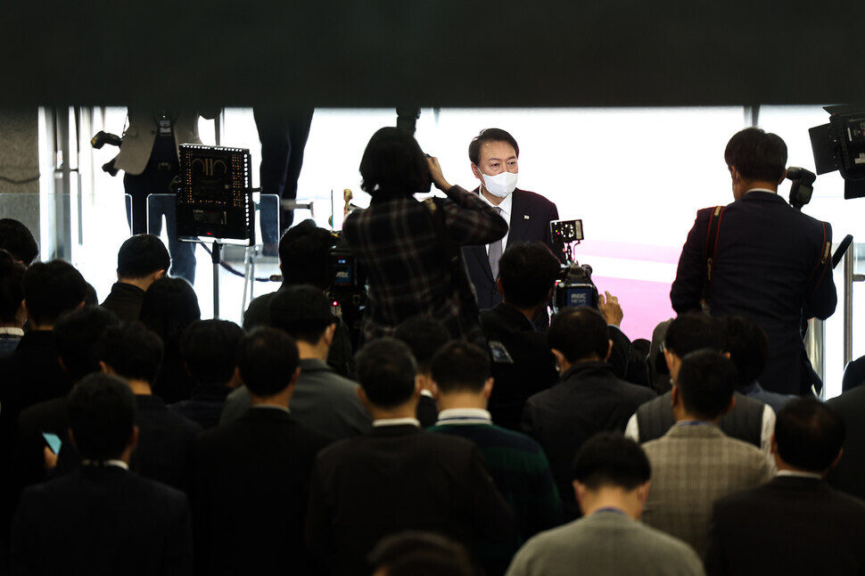 President Yoon Suk-yeol speaks to reports as he heads into the presidential office in Seoul’s Yongsan District on Oct. 24. (presidential office pool photo)