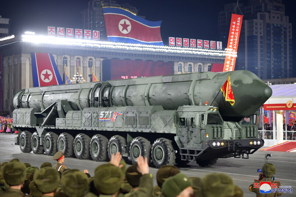 A missile presumed to be a solid fuel ICBM, shown here in this photo released by state media, appeared at the nighttime military parade in Pyongyang’s Kim Il-sung Square held for the 75th founding anniversary of the Korean People’s Army on Feb. 8. (KCNA/Yonhap)