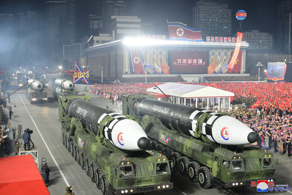 Multiple of North Korea’s latest ICBM, the Hwasong-17, are paraded across Kim Il-sung Square in Pyongyang on Feb. 8 during a parade marking the 75th founding anniversary of the Korean People’s Army. (KCNA/Yonhap)