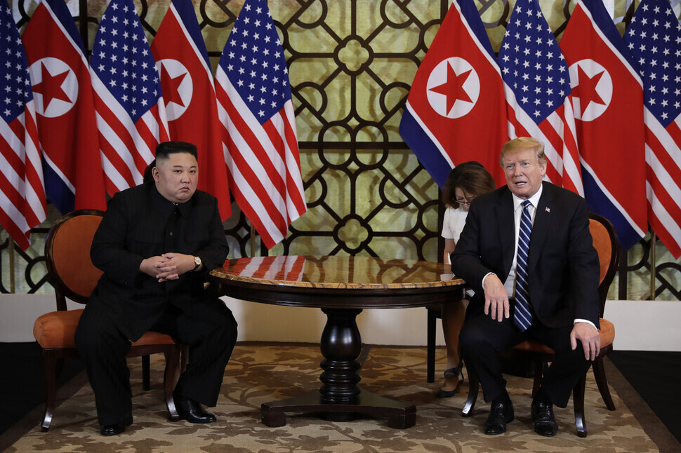 North Korean leader Kim Jong-un sits with US President Donald Trump during their summit in Hanoi, Vietnam, in 2019. (AP/Yonhap)