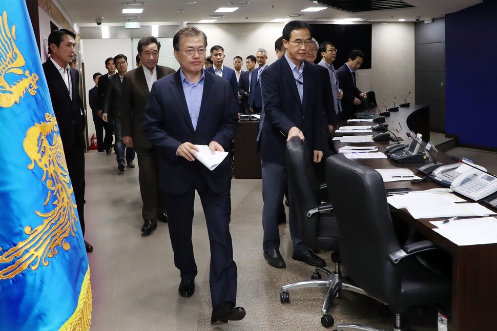 President Moon Jae-in enters the Blue House Crisis Management Center to preside over a meeting of the National Security Council on Sept. 3 following North Korea’s sixth nuclear test earlier in the day.  (Blue House Photo Pool)