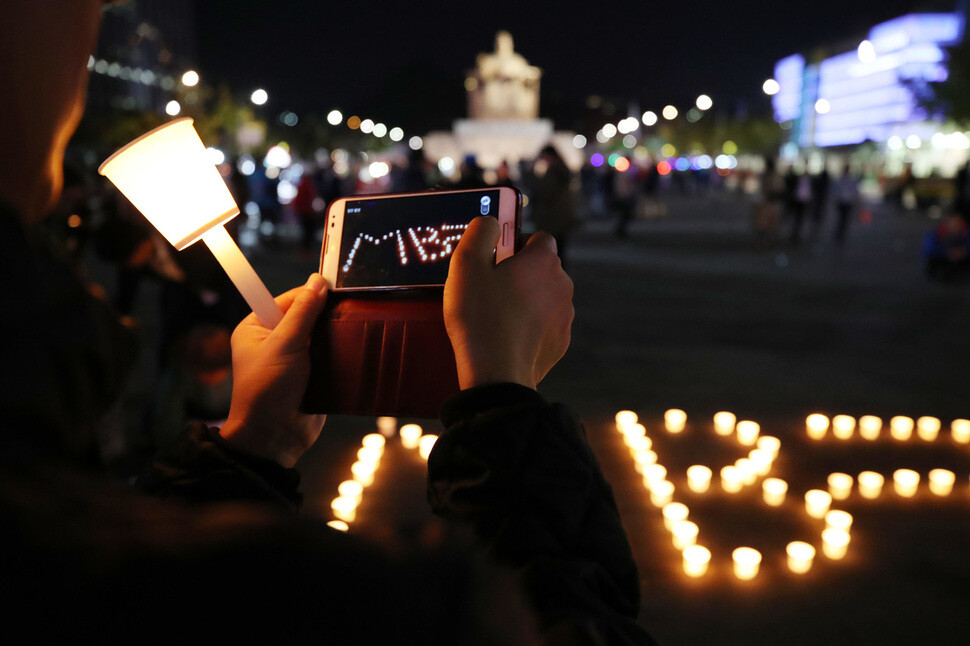 At a candlelight demonstration on Oct. 29