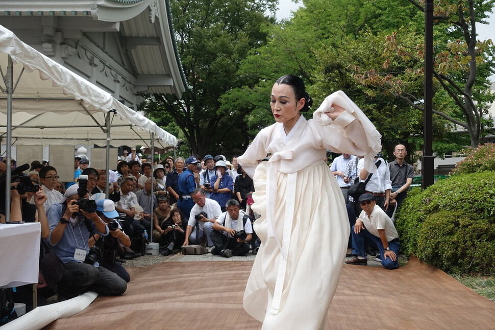 Dancer Kim Sun-ja performs at the ceremony to commemorate the massacre victims.