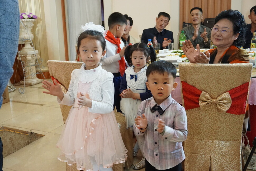 North Korean children at a wedding on the second floor of an Italian restaurant in Pyongyang’s Mangyongdae District on May 9.