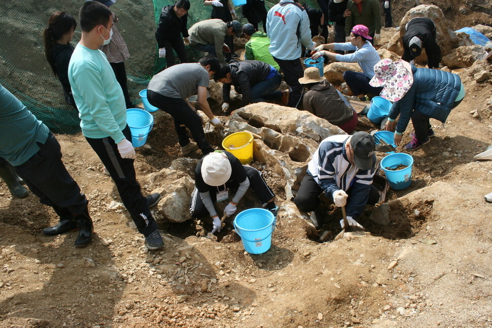 An excavation takes place in the town of Motobu, Kunigami District, Okinawa Prefecture, on Feb. 9.