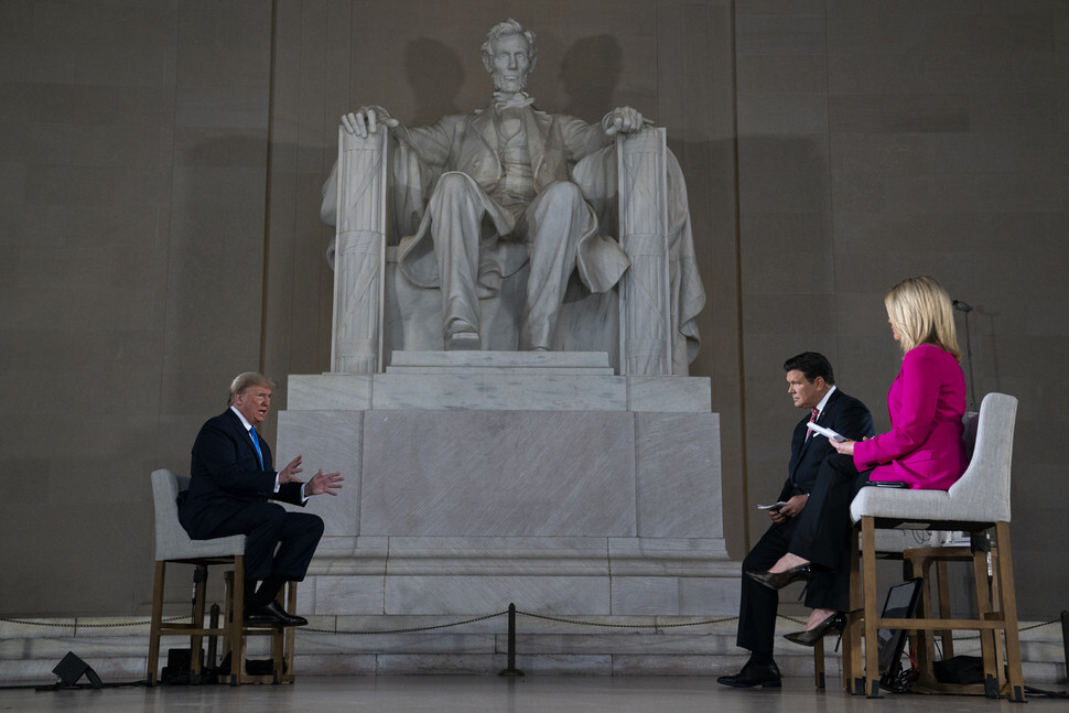 US President Donald Trump speaks during a virtual town hall meeting with Fox News reporters at the Lincoln Memorial in Washington, DC, on May 3. (AP/Yonhap News)