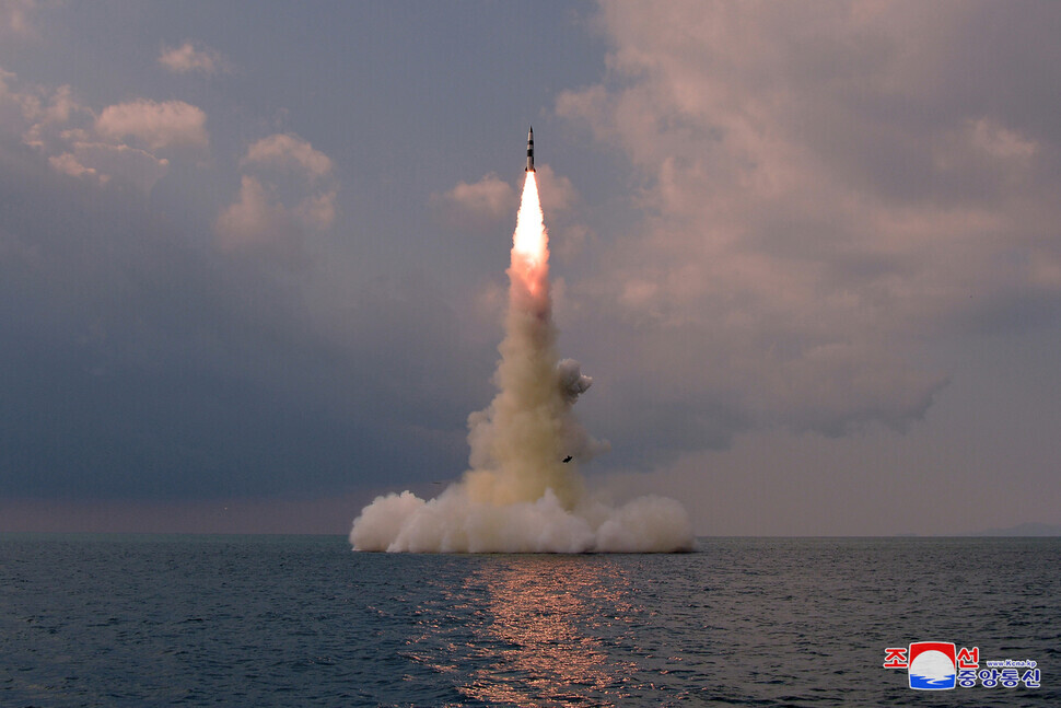 The new submarine-launched ballistic missile tested by the North on Tuesday flies skyward from the water. (KCNA/Yonhap News)