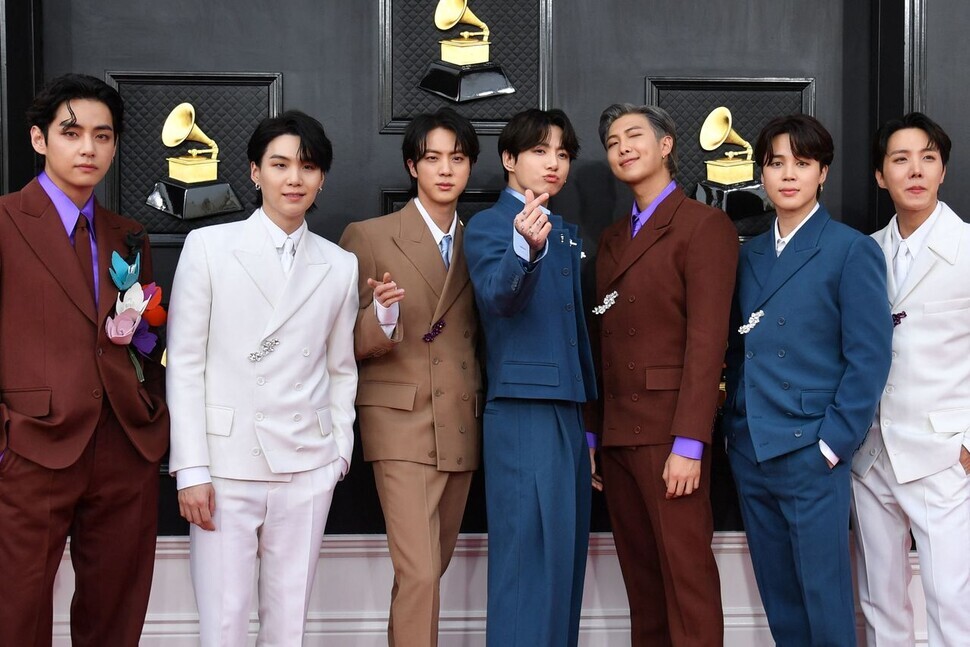 BTS members pose for photos on the red carpet at the 64th Grammy Awards, held in Las Vegas, Nevada, on March 3. (AFP/Yonhap News)
