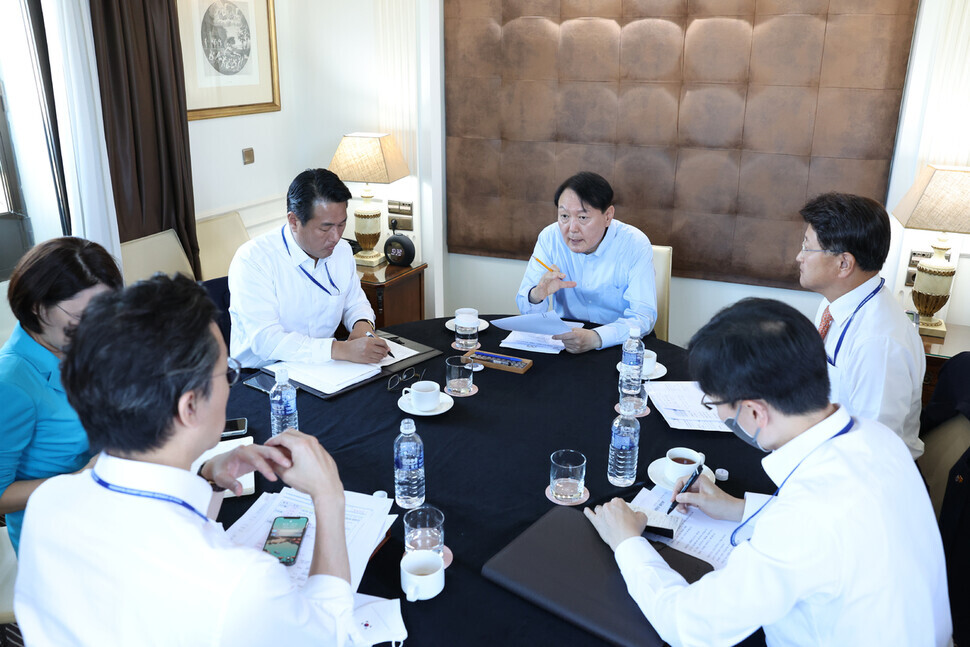 President Yoon Suk-yeol leads a pre-summit check meeting ahead of the NATO summit in Madrid, Spain, on June 28. (Yonhap News)