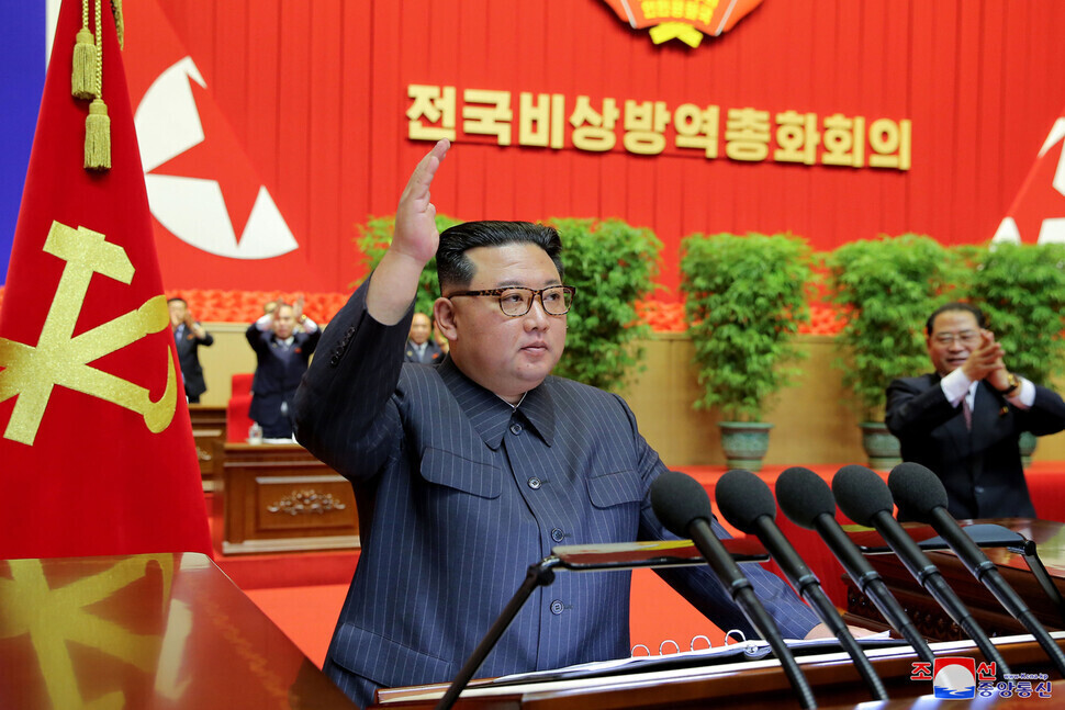 North Korean leader Kim Jong-un speaks at a nationwide meeting on the country’s anti-epidemic campaign on Aug. 10, where he declared victory over COVID-19, in this photo provided by the state-run Korea Central News Agency. (KCNA/Yonhap)