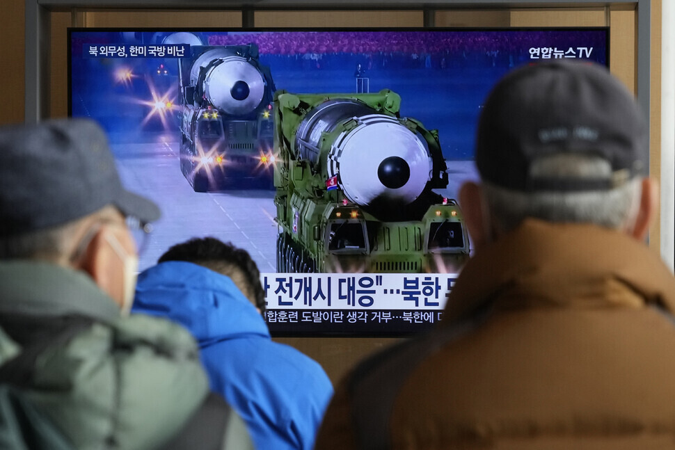 A monitor at Seoul Station plays a news broadcast on North Korea, showing footage of a military parade that included missiles, on Feb. 2. (AP/Yonhap)