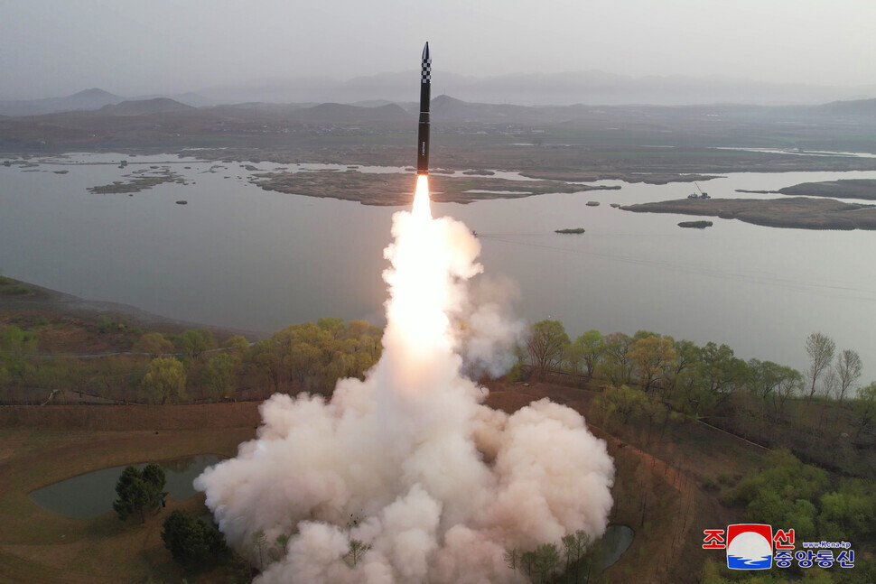State media on April 13 released this photo from the launch of what it called the “new-type ICBM, Hwasongpho-18.” The “first test-fire” of the launch was guided by leader Kim Jong-un, reported Rodong Sinmun. (KCNA/Yonhap)