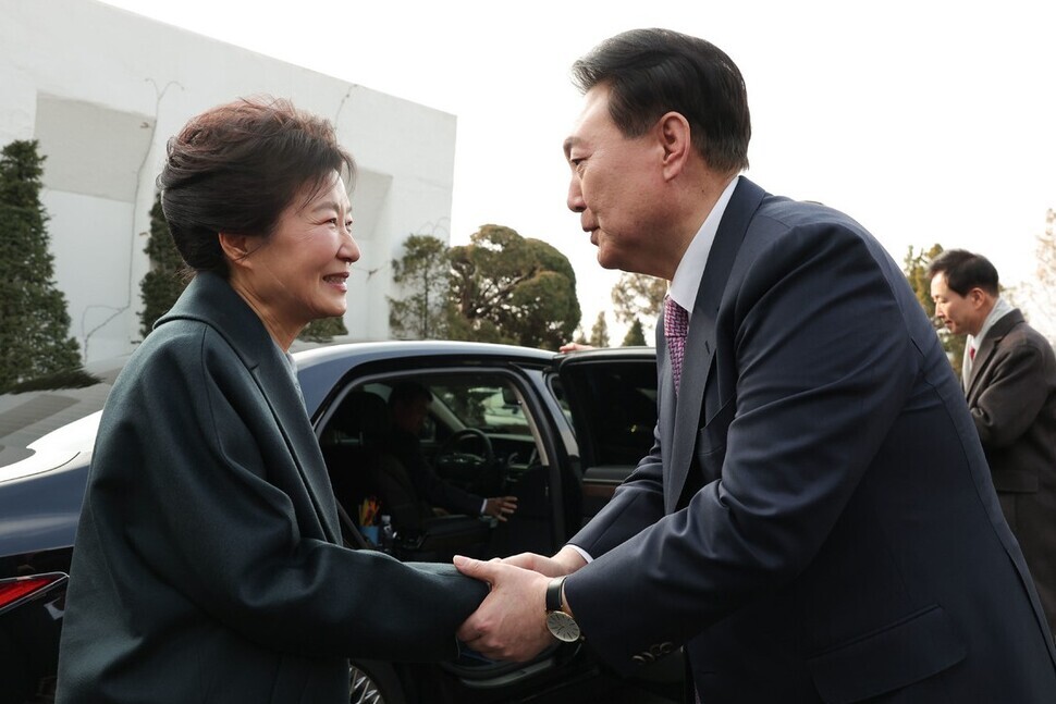 President Yoon Suk-yeol (right) sees off impeached former President Park Geun-hye after a luncheon on Dec. 29, 2023, at the presidential residence. (courtesy of the presidential office)