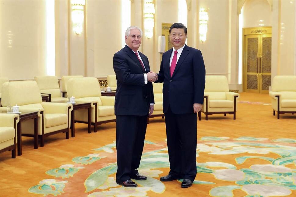 US Secretary of State Rex Tillerson shakes hands with Chinese President Xi Jinping in Beijing