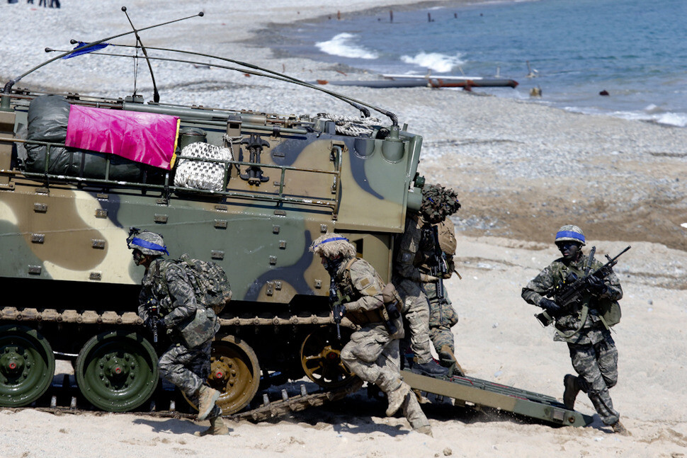 Soliers of the combined forces take part in a joint military exercise at a beach in Pohang