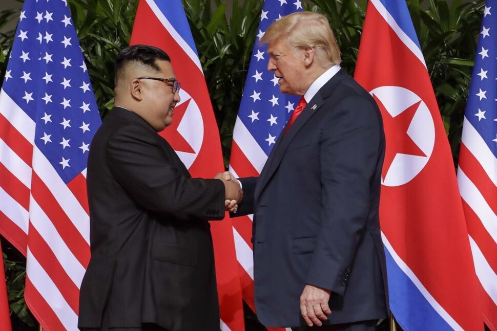 North Korean leader Kim Jong-un and US President Donald Trump during their first summit in Singapore on June 12.