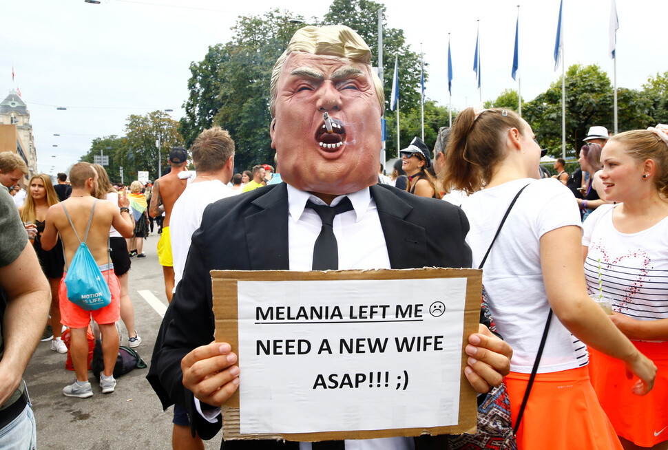 A person dressed in a satirical outfit imitating US President Donald Trump in Zurich