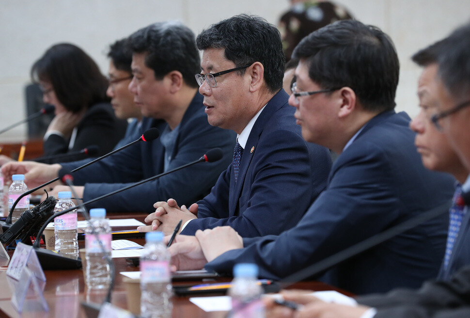 South Korean Unification Minister Kim Yeon-chul (fourth from left) meets with representatives from the Korean Council for Reconciliation and Cooperation (KCRC)