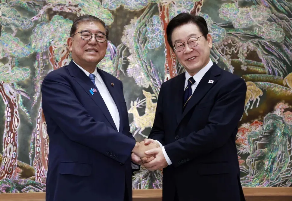 Leaders of Korea, Japan vow joint response to trade turmoil