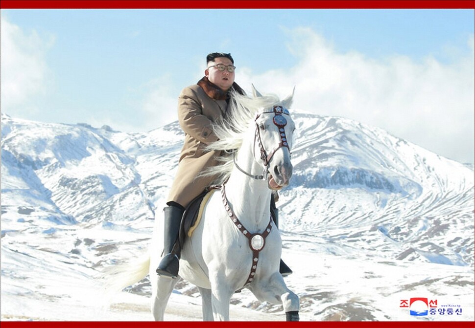 North Korean leader Kim Jong-un is pictured riding a white horse up Mt. Paekdu