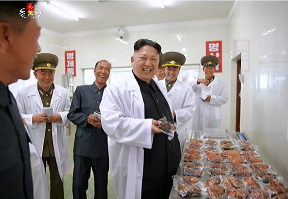 North Korean leader Kim Jong-un during a visit to a pork factory in an air force unit