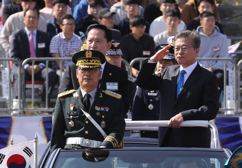 President Moon Jae-in gives a salute while inspecting troops at a ceremony in advance of Armed Services Day at the South Korean Navy’s Second Fleet Command in Pyeongtaek
