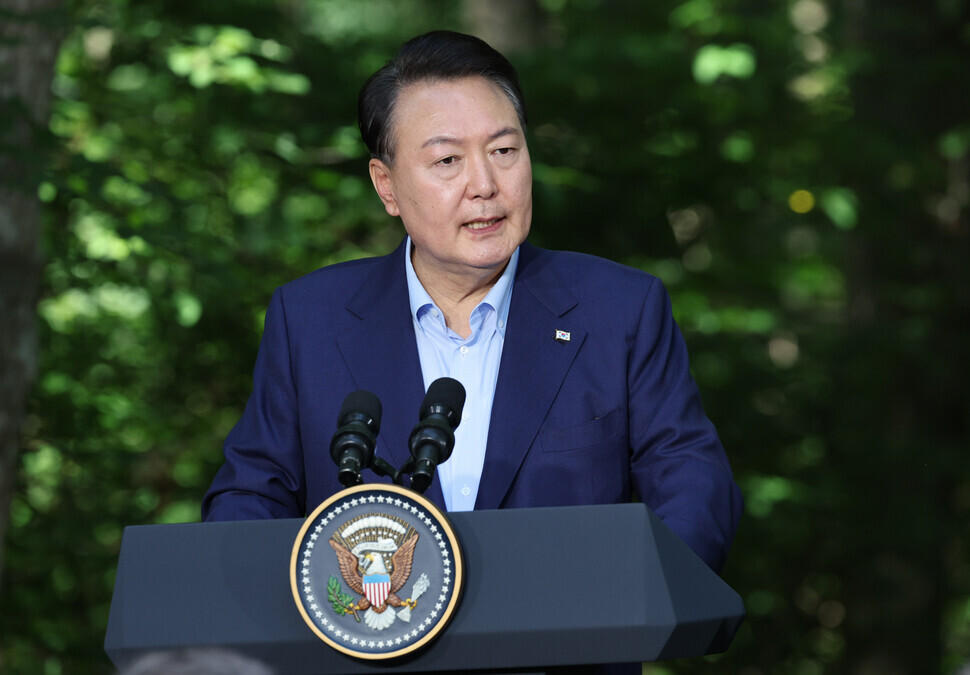 President Yoon Suk-yeol of South Korea speaks at a joint press conference following a trilateral summit with the leaders of the US and Japan at Camp David in Washington, DC, on Aug. 18. (Yonhap)