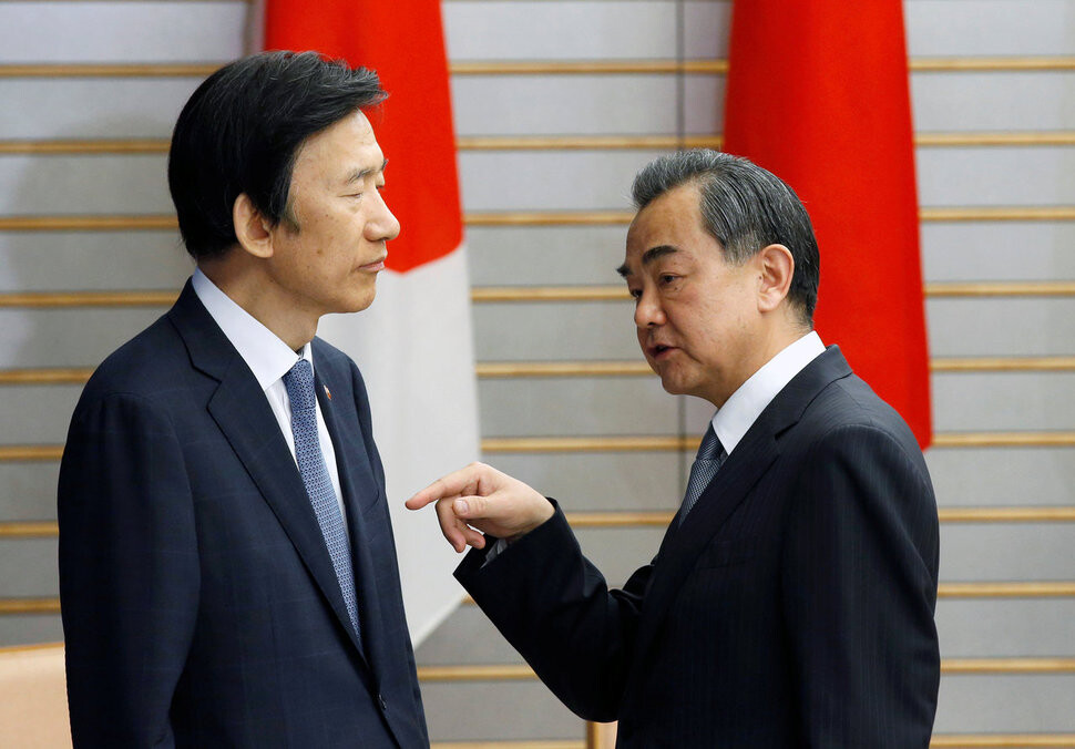 South Korean Foreign Minister Yun Byung-se talks with Chinese Foreign Minister Wang Yi