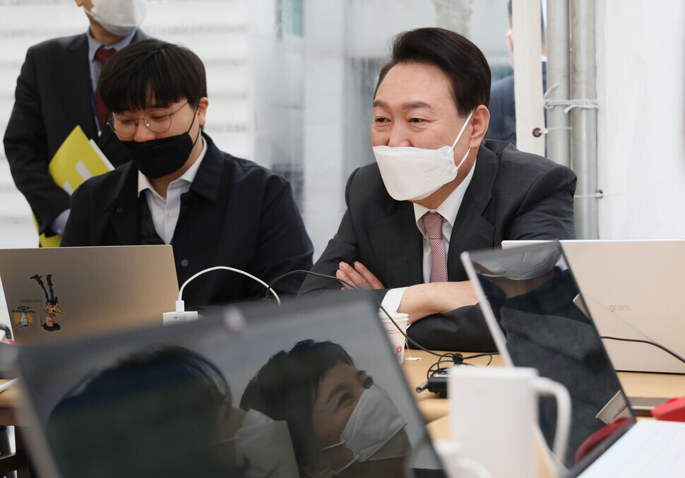 President-elect Yoon Suk-yeol speaks with members of the press at a press room set up in his transition team’s office in the Tongui neighborhood of Seoul. (Yonhap News)