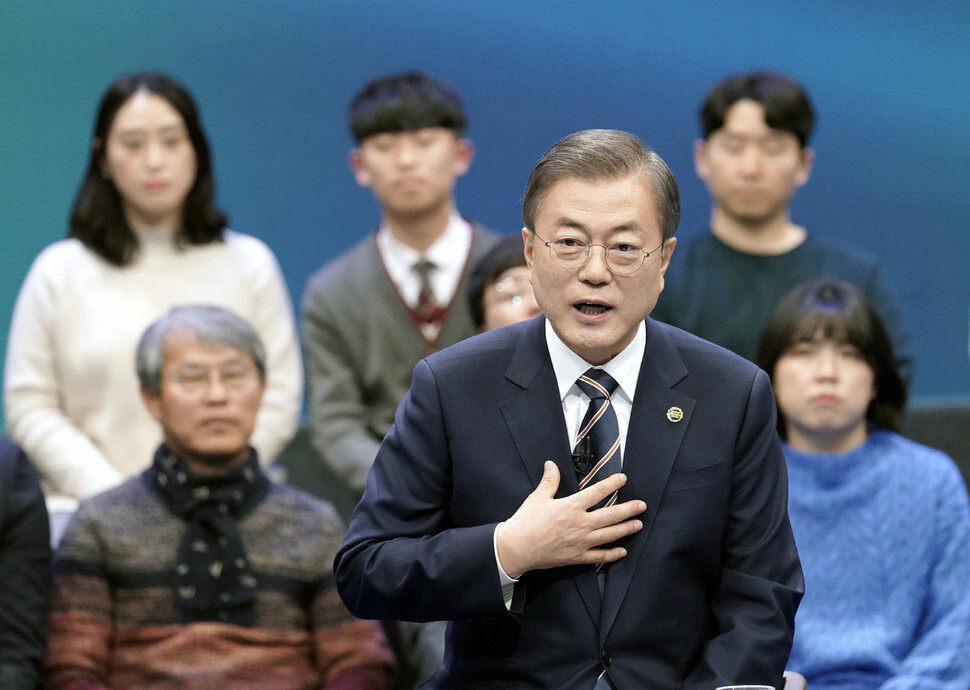South Korean President Moon Jae-in responds to questions during a town hall meeting broadcasted by MBC on Nov. 19. (Blue House photo pool)