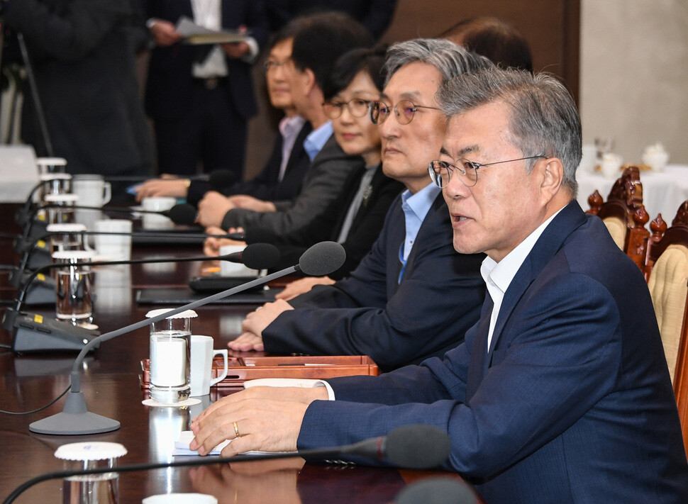 South Korean President Moon Jae-in presides over a meeting with senior secretaries and advisors at the Blue House on Feb. 11. (Blue House photo pool)