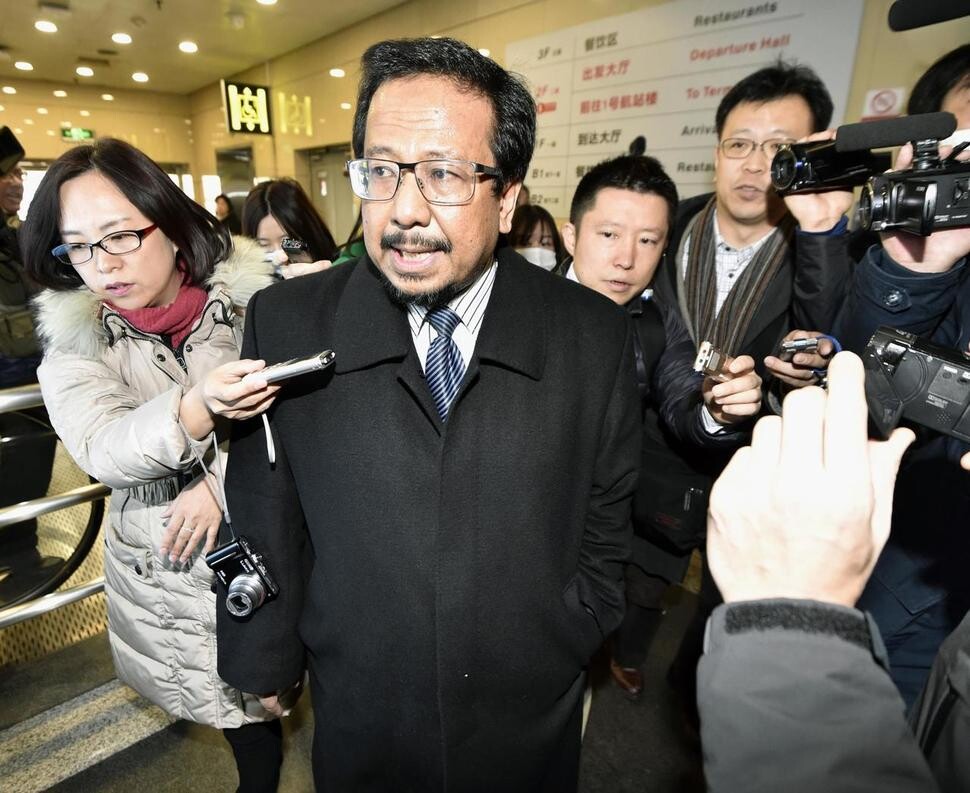 Malaysian Ambassador to North Korea Mohammad Nizan Bin Mohammad responds to reporters’ questions as he arrives at Beijing International Airport after being recalled to Kuala Lumpur to express discontent with North Korea’s criticism of the investigation into Kim Jong-nam’s death