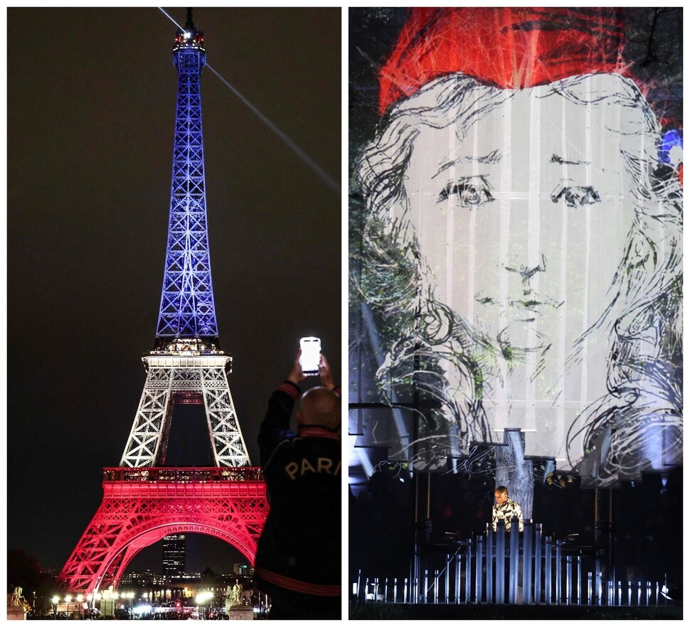 파리의 상징인 에펠탑이 13일(현지시각) 프랑스 국기의 세 색깔로 물들어 있다.(왼쪽 사진) 한 음악가가 10주기 추모 행사에서 연주하고 있다. 파리/AFP EPA 연합뉴스