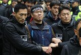 交通妨害で逮捕し別件で逮捕状請求…民主労総委員長に騒擾罪適用を検討